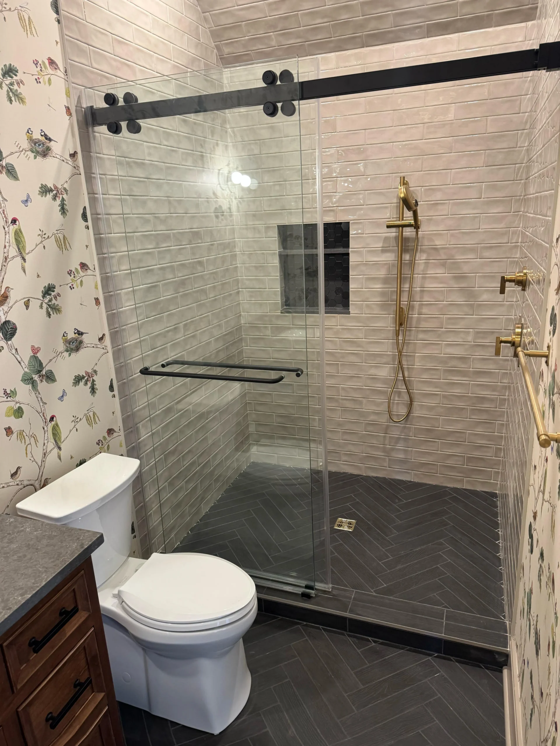 Virginia guest bathroom with frameless shower by FT Remodeling