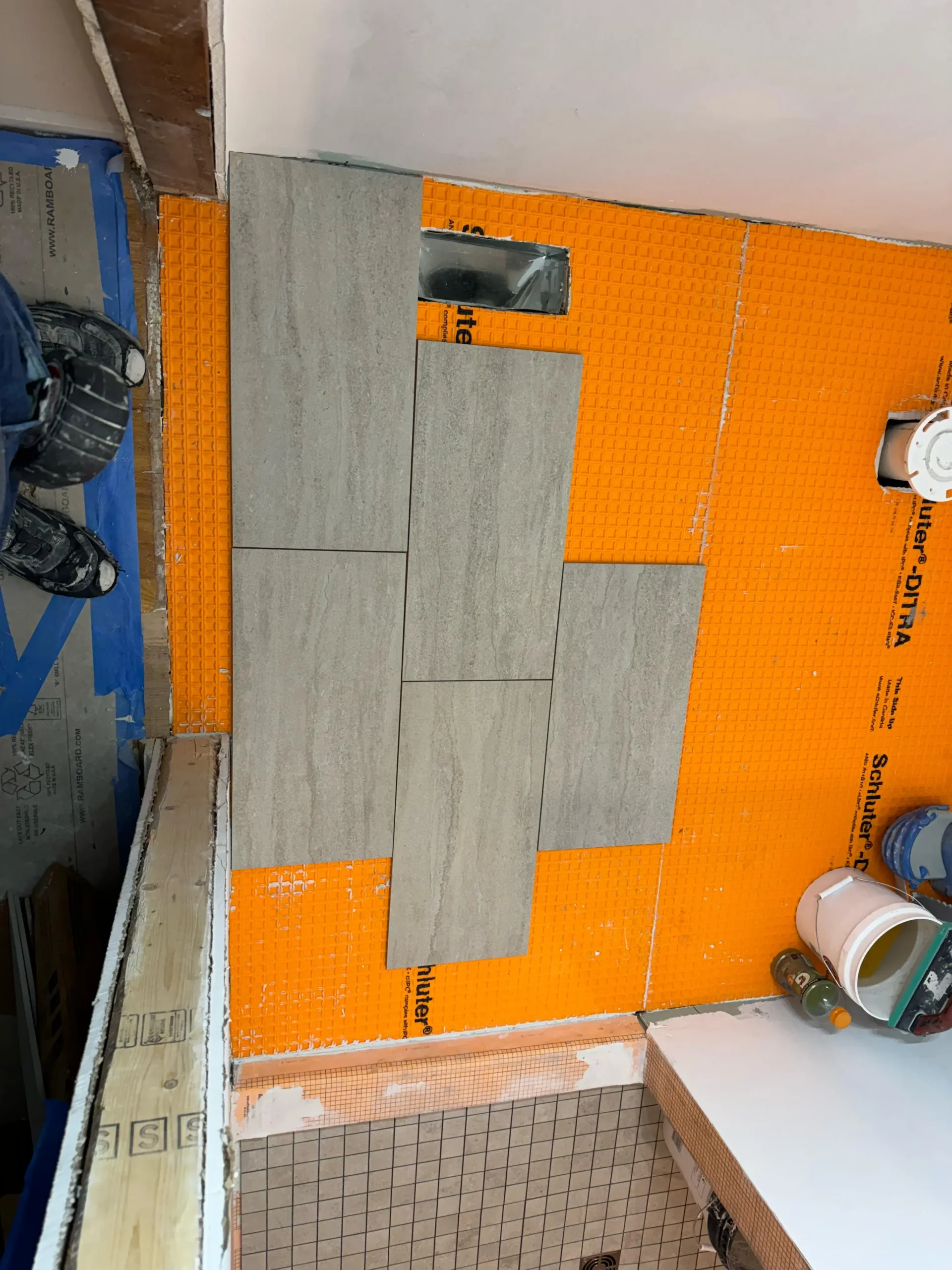 Virginia tile installation with marble and porcelain by FT Remodeling