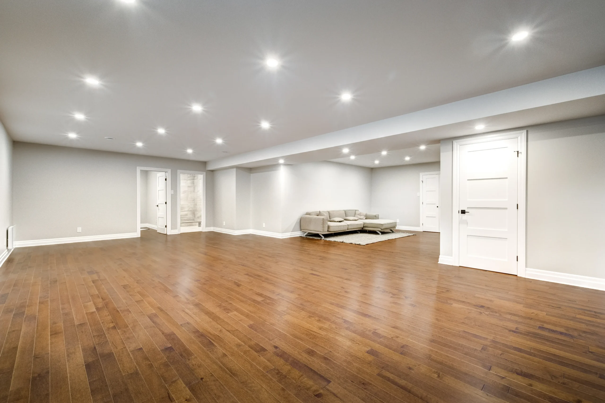 Finished Virginia basement family room by FT Remodeling