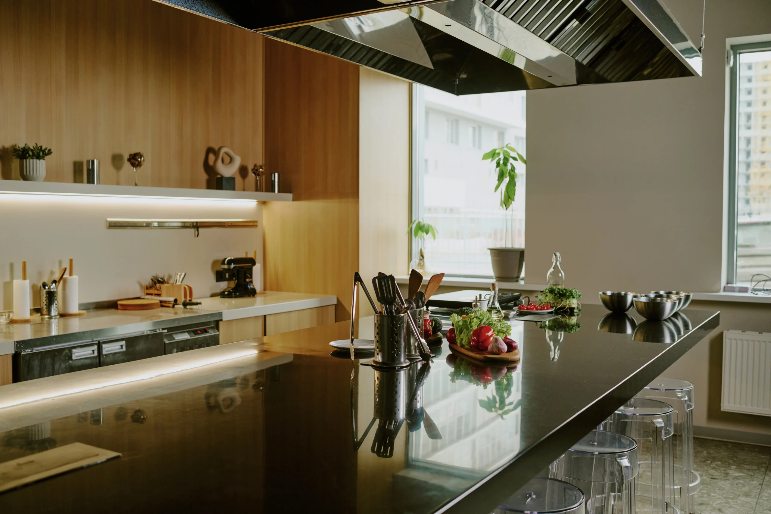 Modern kitchen with flat-panel cabinetry in Virginia by FT Remodeling