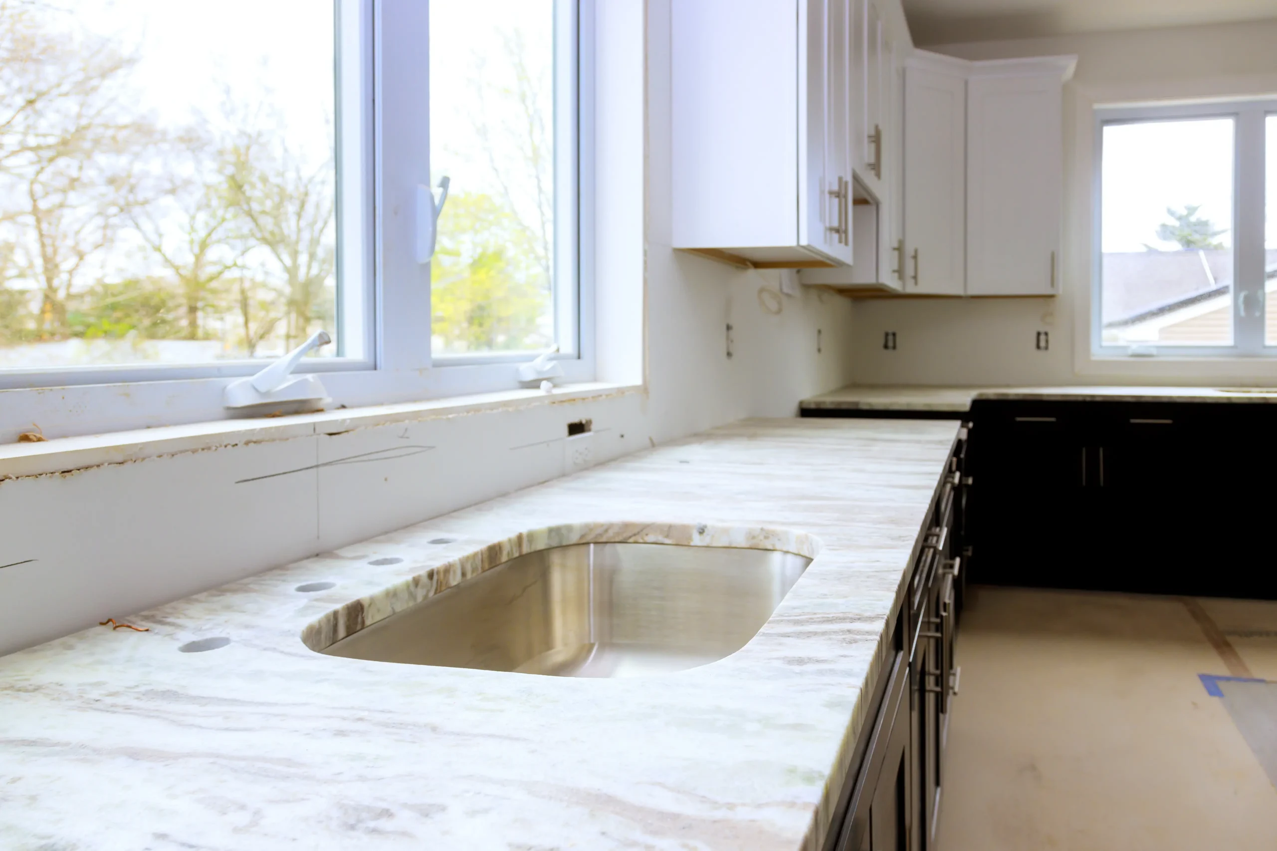 Traditional kitchen with raised-panel cabinetry in Virginia by FT Remodeling