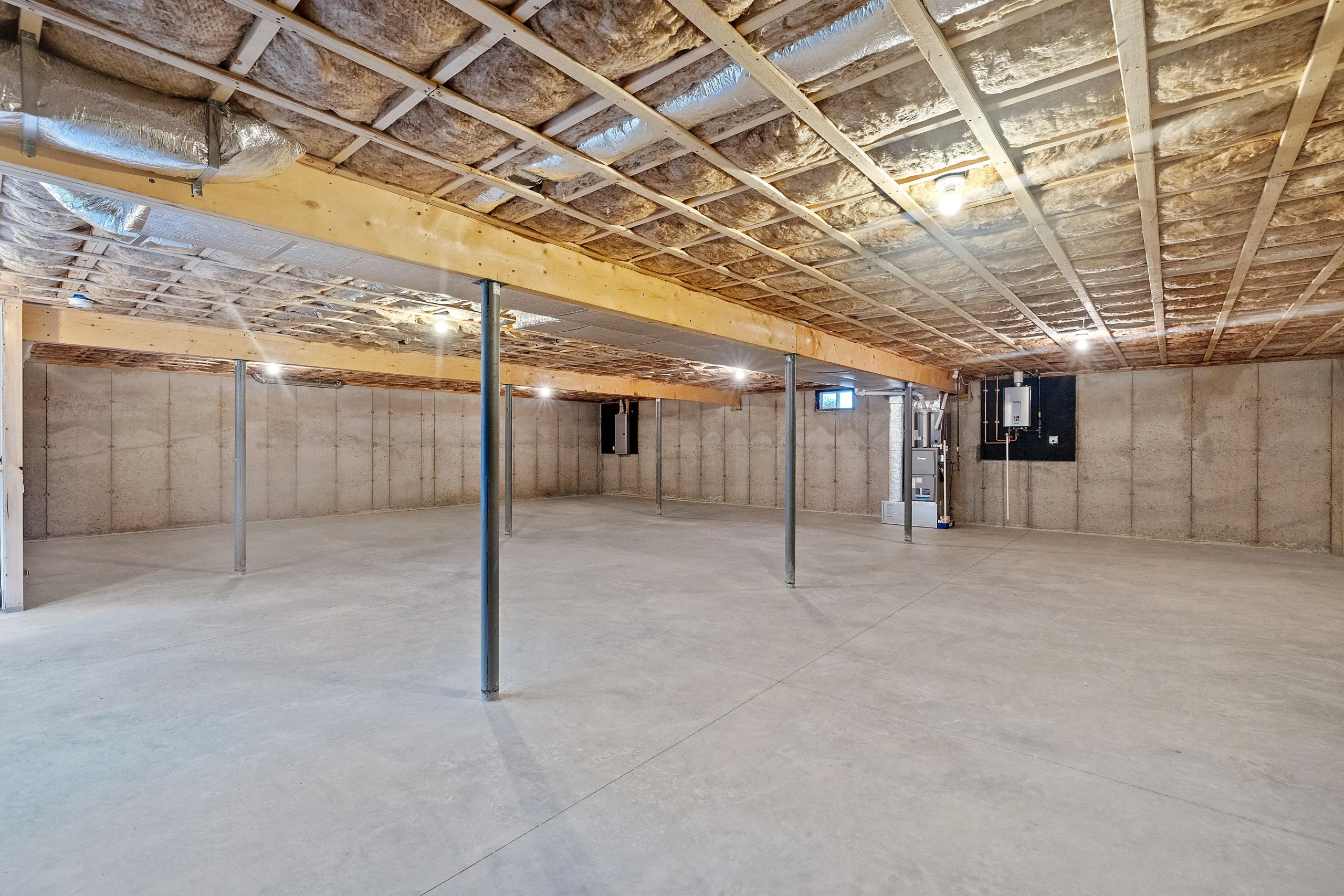 Unfinished Virginia basement before finishing by FT Remodeling